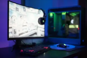 Gaming PC and console on a desk